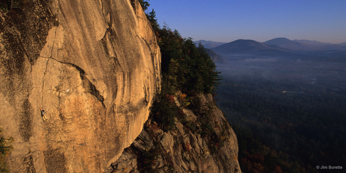 Dana Drummond climbing Tourist Treat on Cathedral Ledge, photo by Jim Surette.